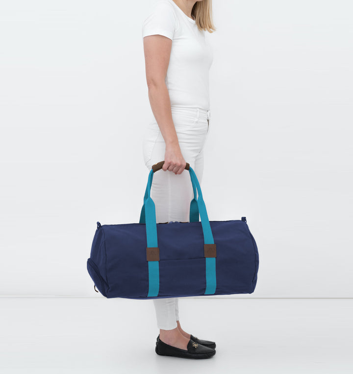 Dufflebag -M- NAVY mit türkisem Gurtband